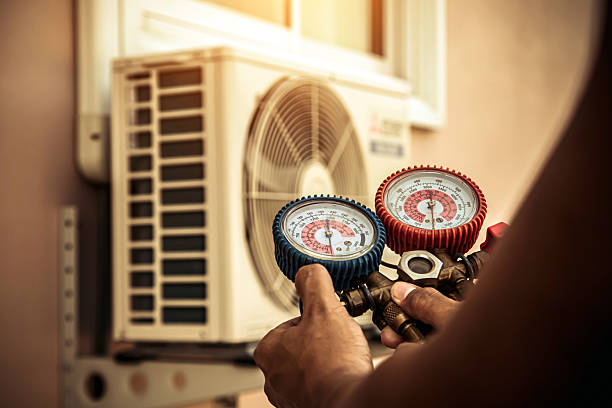 Professional Air Conditioning Service technician working in Vincent, CA